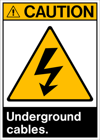 A caution sign with a yellow triangular background and a black text that reads 'CAUTION UNDERGROUND CABLES.' There is a lightning bolt symbol in the center of the sign.