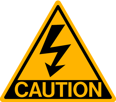 A yellow safety sign with a black lightning bolt and directional arrow indicating high voltage and text 'CAUTION'