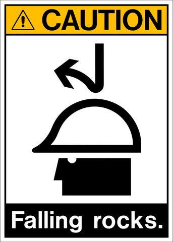 A white sign with a black and yellow caution banner and the words falling rocks and an ANSI specification graphic.