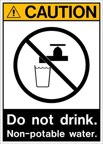 Yellow Caution Banner sign with black text and icon indicating 'CAUTION non-Potable Water' with an exclamation point at the top and 'DO NOT DRINK' 