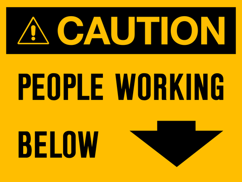 A yellow sign with black text and an arrow pointing downwards, reading 'CAUTION PEOPLE WORKING BELOW'.