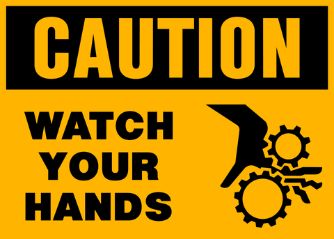 Safety sign with the words 'CAUTION WATCH YOUR HANDS' and a pictogram of gears on a yellow background.