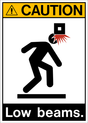 Caution sign with a pictogram of a person bumping their head and text 'LOW BEAMS.'