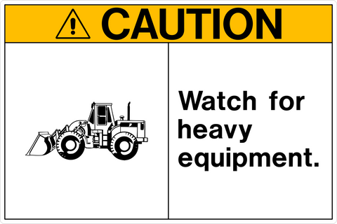 Safety sign with a white background and black text that reads 'CAUTION WATCH FOR HEAVY EQUIPMENT.' There is a pictogram of a tractor on the sign.