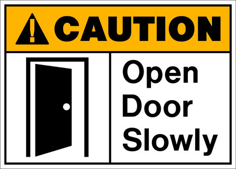 A caution sign with a yellow background and black and white pictogram showing an open door and the text 'CAUTION OPEN DOOR SLOWLY'.