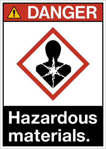 A warning sign with a red and white diamond-shaped pictogram and the text 'DANGER HAZARDOUS MATERIALS.'