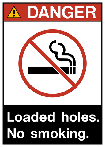 ANSI Loaded Holes No Smoking Danger Sign featuring a no smoking symbol and warning that loaded blast holes require a smoke-free area.