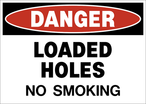 Loaded Holes No Smoking Danger Sign warning that smoking is prohibited near loaded blast holes.