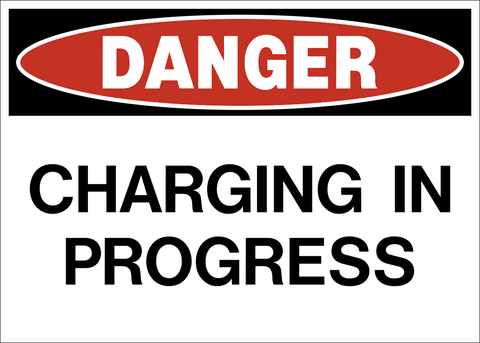 A safety warning sign with a white background and red and black text that reads 'DANGER CHARGING IN PROGRESS'.