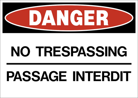 A rectangular sign with a white background and red and black text that reads 'DANGER NO TRESPASSING PASSAGE INTÉRIT'.