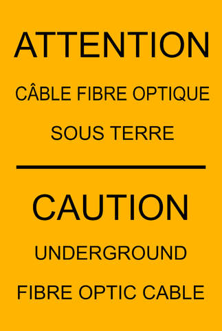 A bilingual safety sign with the words 'ATTENTION' in English and 'CAUTION' in French, highlighting the difference between the two, with a background color of yellow. The remaining text says UNDER GROUND FIBRE OPTIO CABLE