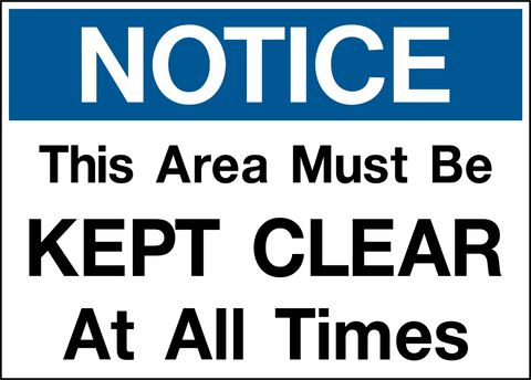 A blue and white safety sign with the text 'NOTICE THIS AREA MUST BE KEPT CLEAR AT ALL TIMES' in bold capital letters.