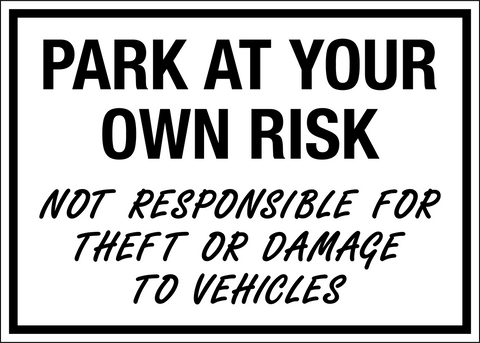 This park at own risk parking sign is a black and white sign and is rectangle shape. 