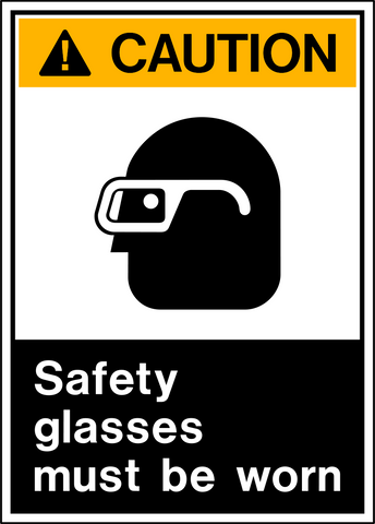 A safety sign with a yellow background and a black and white graphic of a person wearing safety glasses and a caution sign above the text 'SAFETY GLASSES MUST BE WORN'.