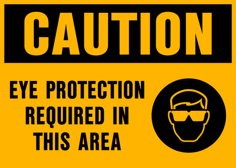 A yellow safety sign with black and white text and icon indicating 'CAUTION EYE PROTECTION REQUIRED IN THIS AREA' along with a pictogram of a person wearing sunglasses and a gas mask.
