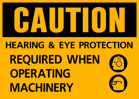 A yellow safety sign with black text and iconography indicating 'CAUTION HEARING AND EYE PROTECTION REQUIRED WHEN OPERATING MACHINERY' along with a symbol depicting ear protection and a pair of eyes.