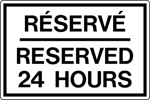 A rectangular parking sign with bold black text that reads 'RESERVÉ' on the top and 'RESERVED 24 HOURS' on the bottom, set on a reflective aluminum background.