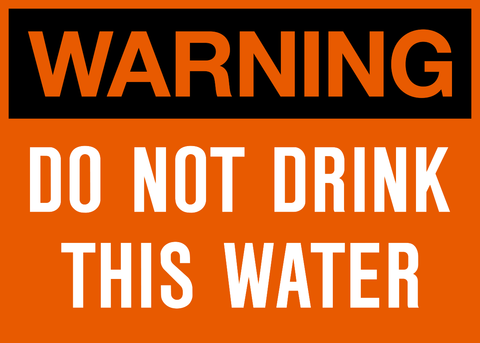 A warning sign with an orange background and black text that reads 'WARNING DO NOT DRINK THIS WATER'.